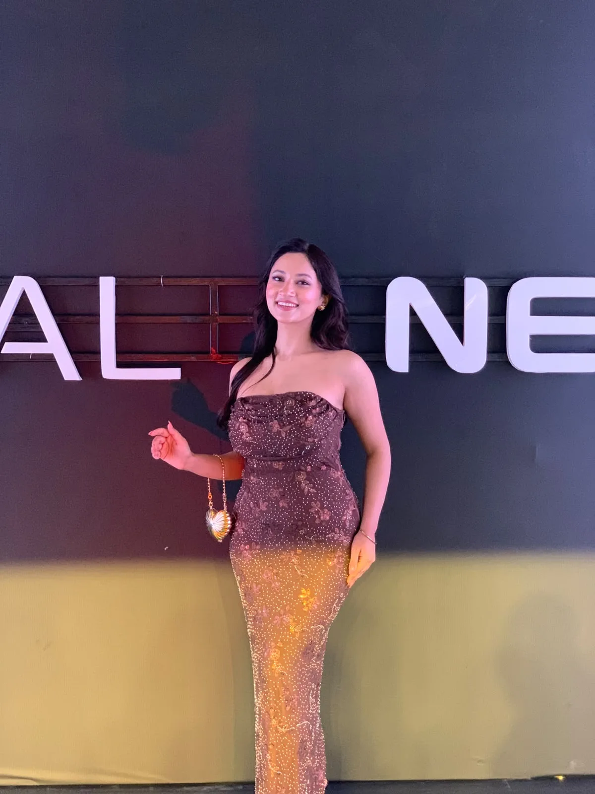 Shristi Bhusal in a sparkly floral gown at a gala event