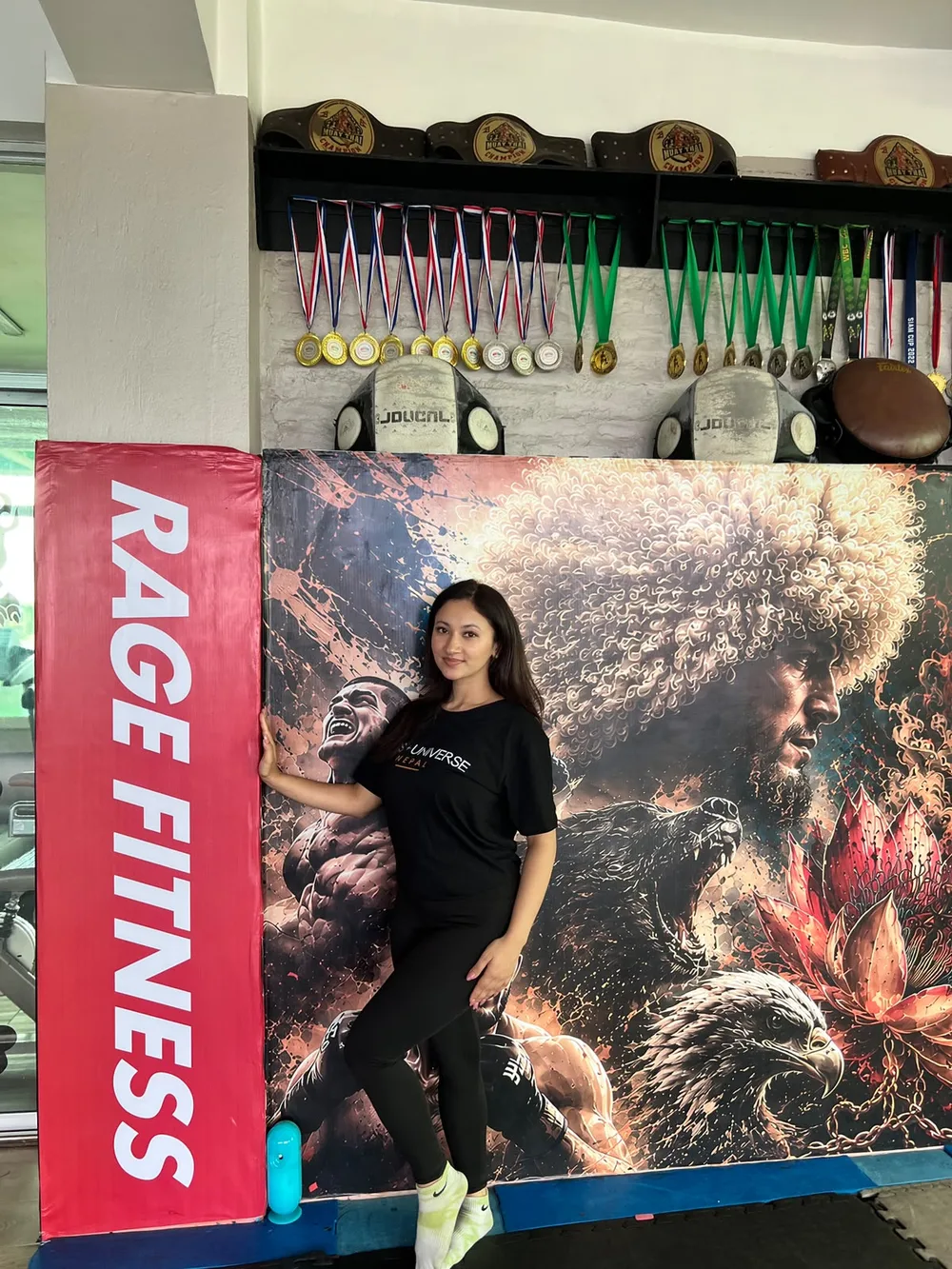 Shristi Bhusal training at Rage Fitness gym wearing Miss Universe Nepal shirt